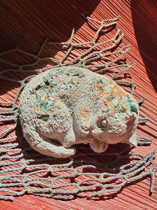 Resting Cement Cat