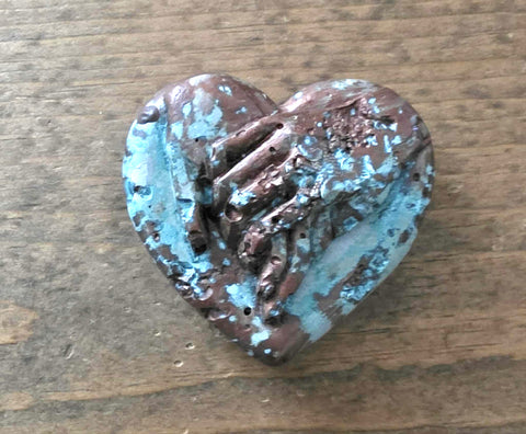 Patina Cement Hand Holding ❤️ Stone